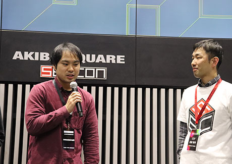 Kuroiwa (left) commenting after victory