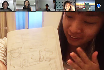 Student explaining her work online