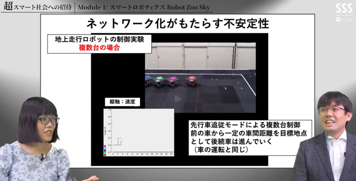 地上走行ロボットの制御実験について話す畑中准教授(右)と多久和講師(左)